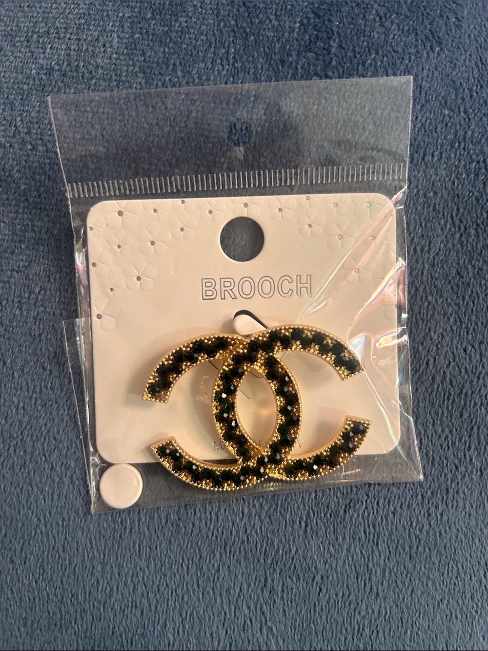Gold-Tone Black Crystal CC-Style Brooch